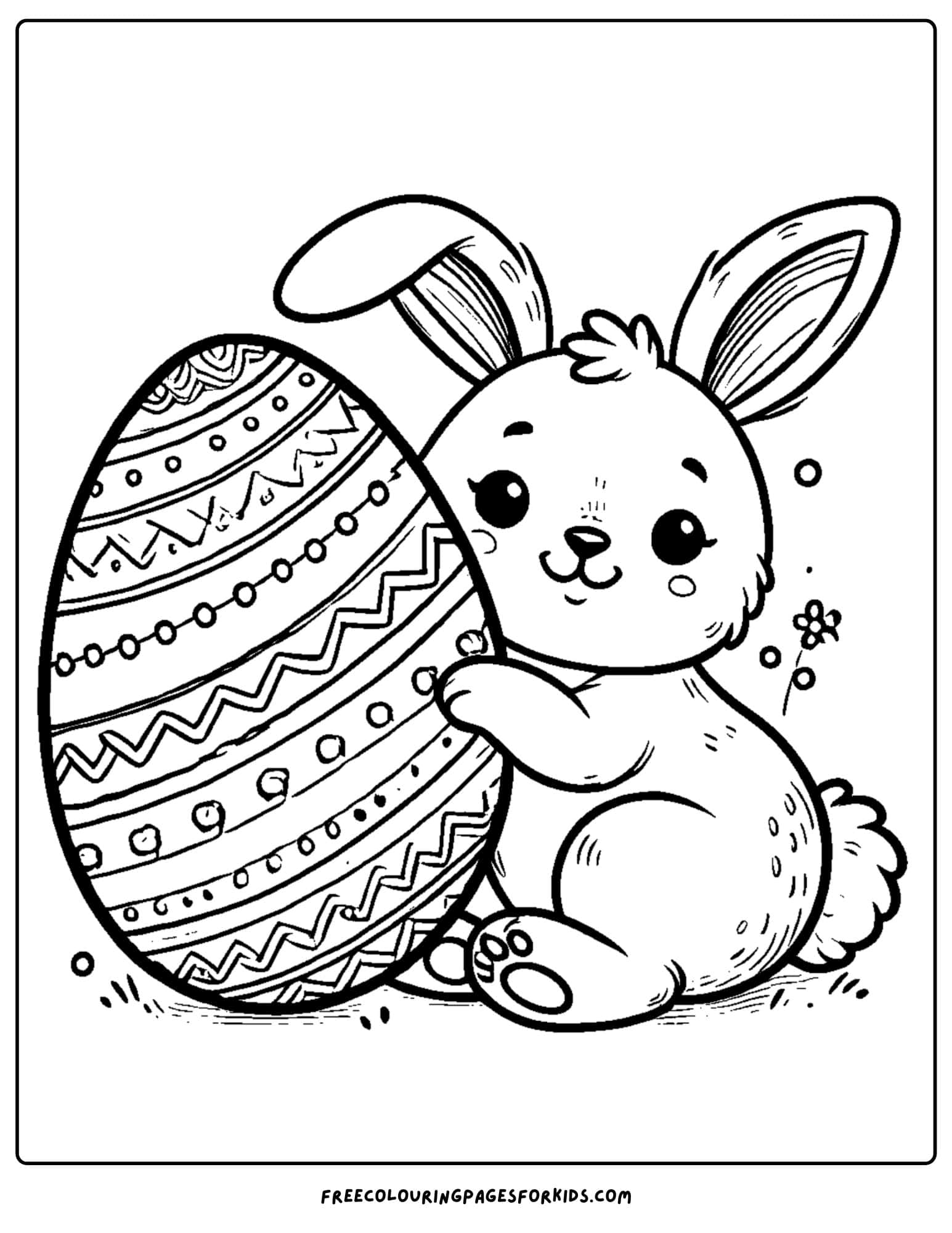 easter bunny with an easter egg coloring page