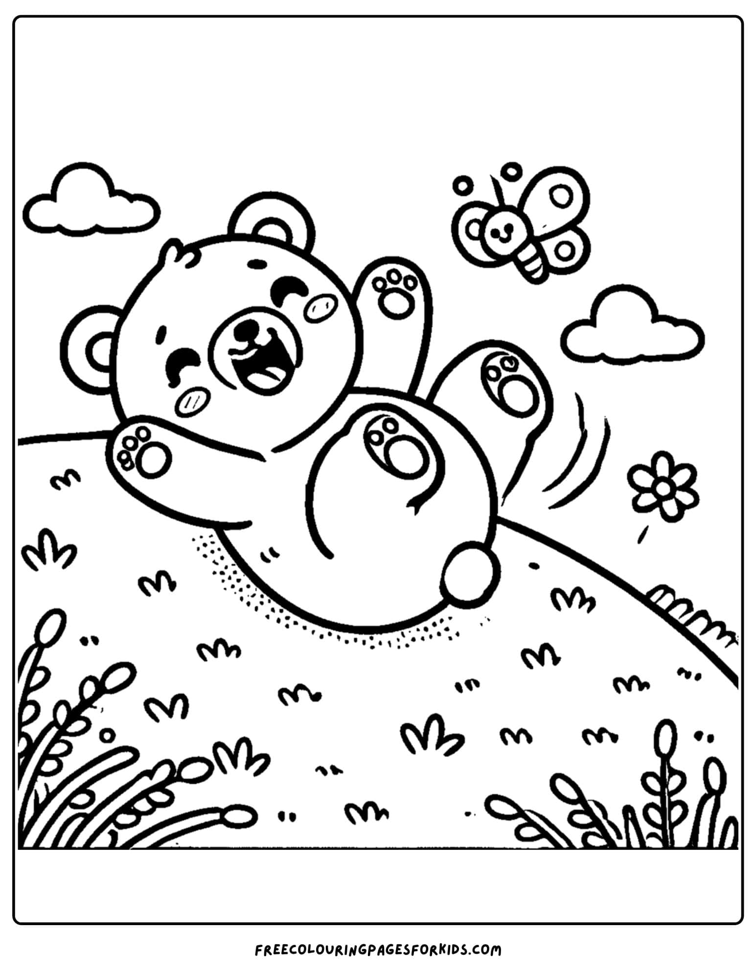 a bear rolling down a hill