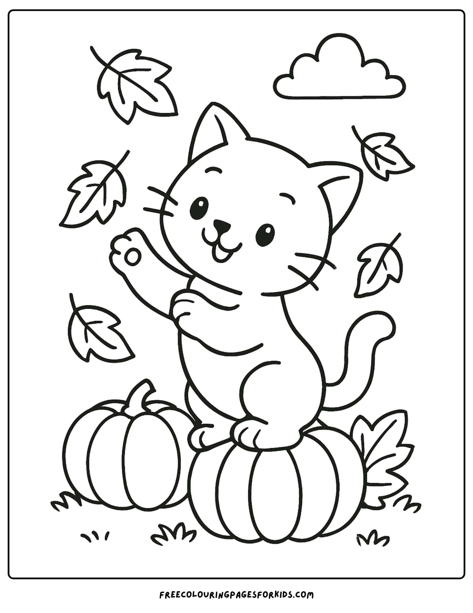 a kitten catching leaves