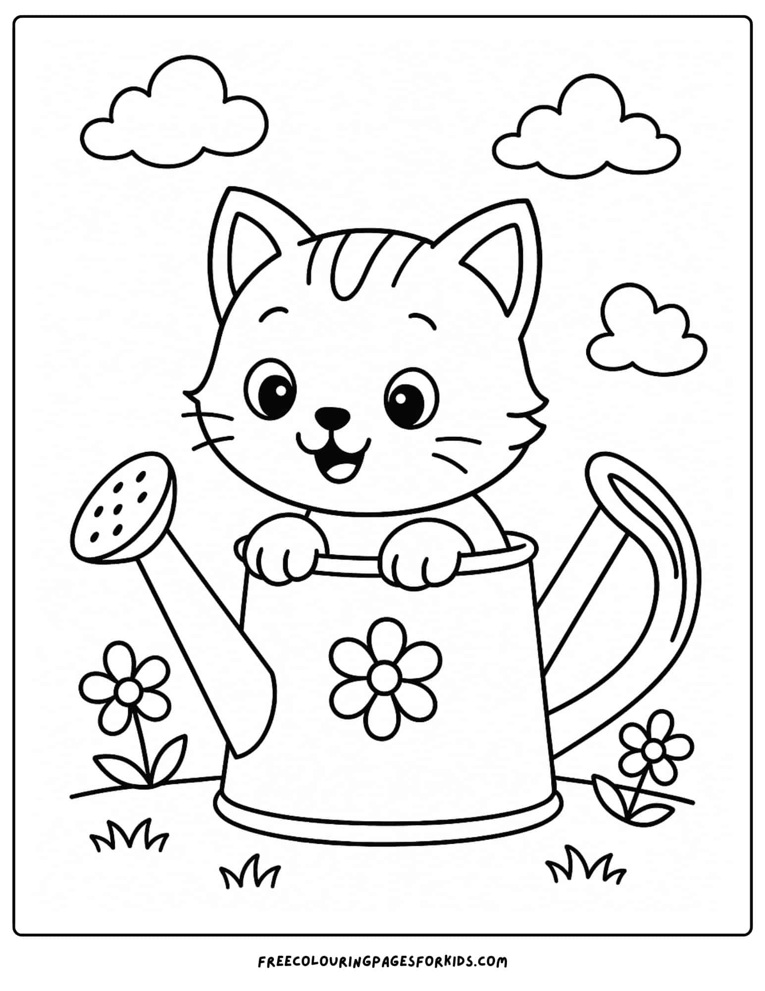 a kitten peaking out of a watering can