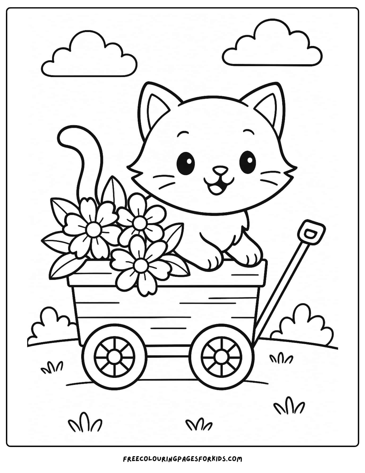 a kitten riding in a flower wagon
