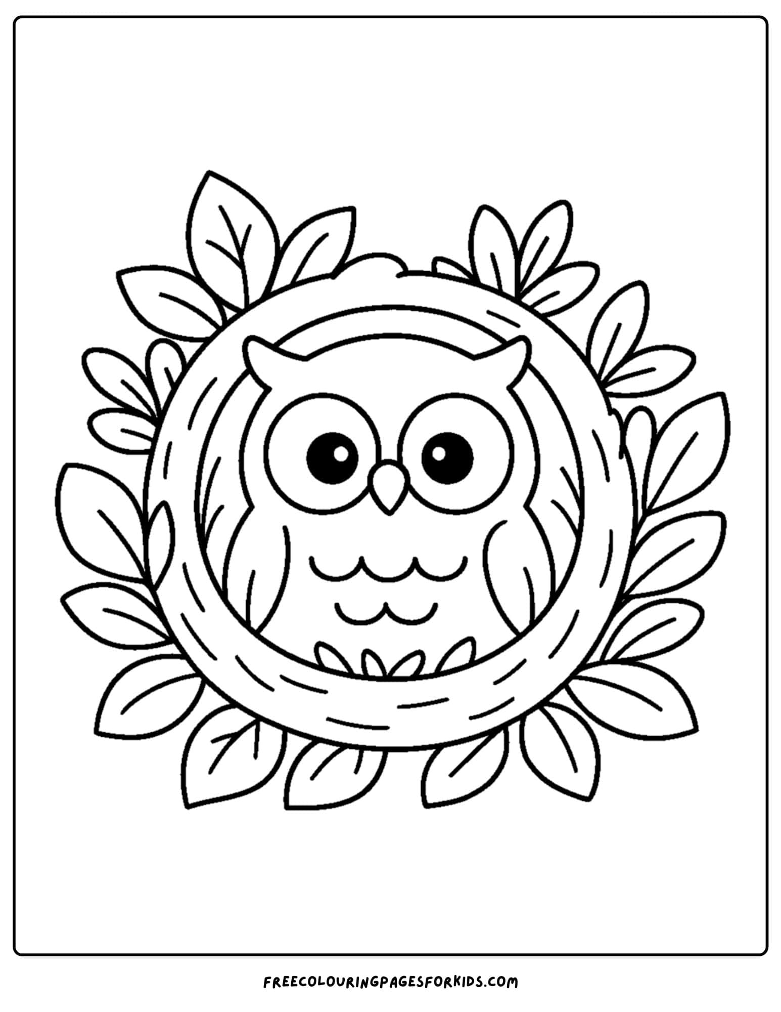 an owl inside a wreath