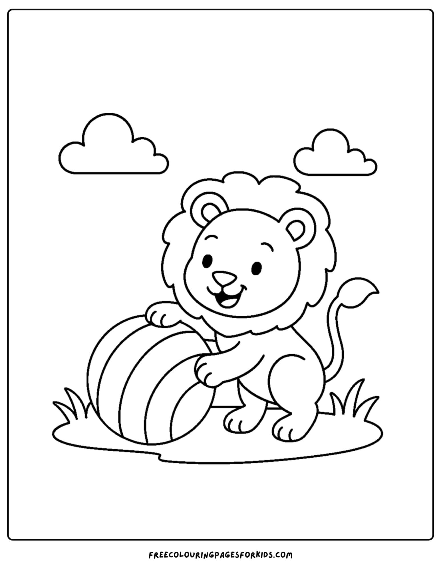 a lion cub with a ball