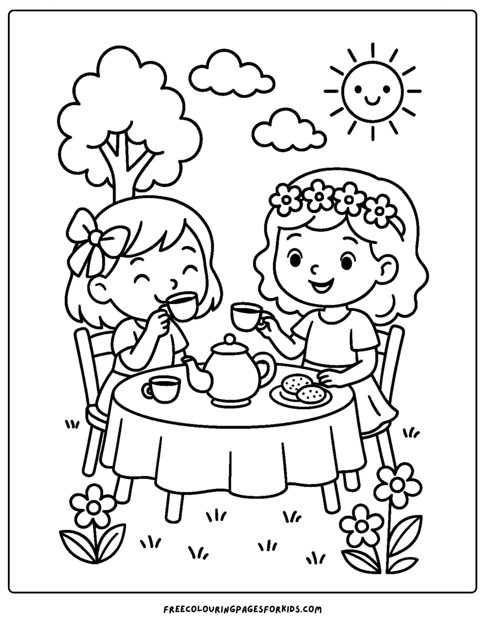 girls having a tea party in the backyard