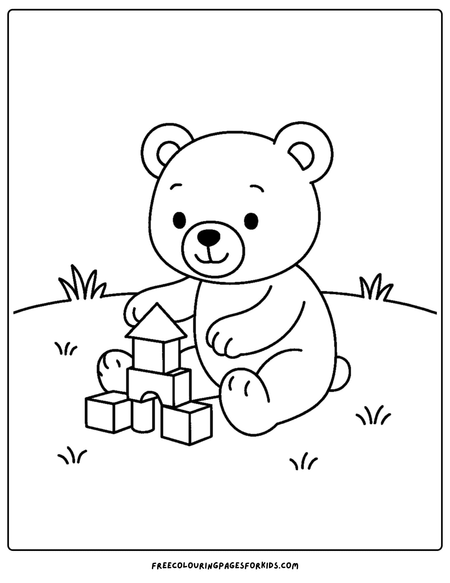 a teddy bear playing with blocks