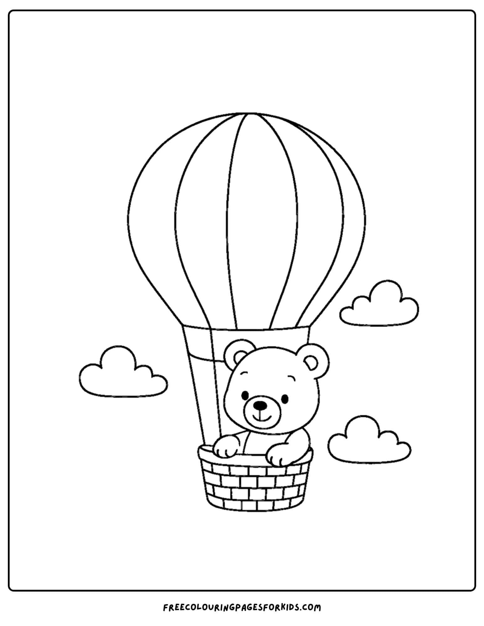 a teddy bear in a hot air balloon