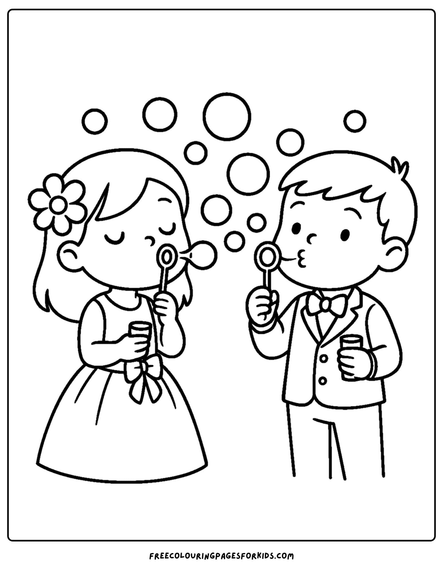 kids blowing bubbles at a wedding