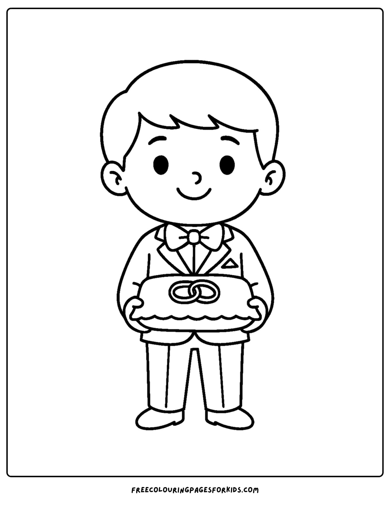 the ring bearer or page boy holding wedding rings on a pillow