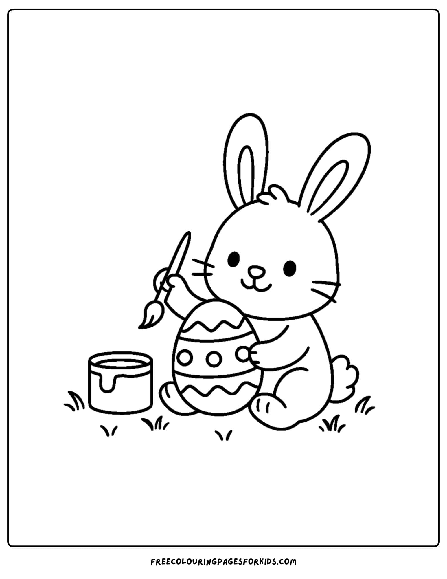 a holiday coloring page featuring a bunny painting an egg